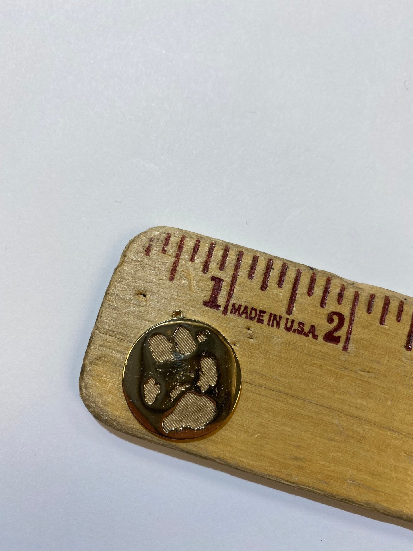 Golden Paw Print Pendant